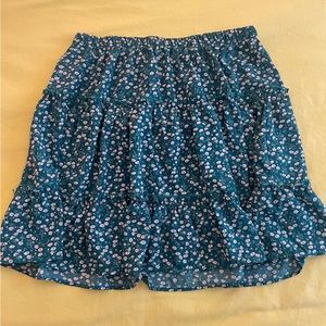 Three medium tiered ruffled green floral skirt